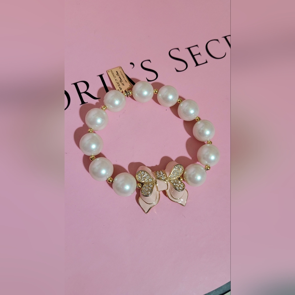 Elegant My Flat In London Pearl Bracelet with Gold Rhinstone Bow Accents